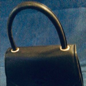 Rich navy pebbled leather purse. New. Jaqueline Onassis style.